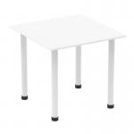 The photo shows a sleek, modern white table with a square top and post leg. The table is dynamic, with a smooth finish and clean lines, making it suitable for a variety of environments.
