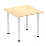 This image shows a modern, square table with a maple top and white post legs. The table is designed with versatility and functionality in mind, with a dynamic appearance that adds style to any space. Clean lines and a neutral color palette make it a versatile choice for various settings.