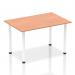 In the photo, a beech-colored table top sits atop four white post legs, creating a sleek and modern aesthetic. The table appears sturdy and spacious, perfect for use in a dynamic workspace or meeting area. The clean lines and minimalist design make it a versatile choice for any office setting.