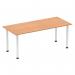This image shows a sleek and modern Dynamic Tables Impulse 1800mm Straight Table with an oak top and white post legs. The table exudes a sense of dynamic energy with its clean lines and smooth surfaces. It is a stunning addition to any space, adding a touch of sophistication and style.