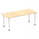 The image shows a sleek and modern Dynamic Tables Impulse 1800mm Straight Table with a maple tabletop and white post legs. The table exudes a sense of sophistication and complements any contemporary workspace.