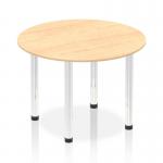 The picture shows a dynamic round table with a 1000mm diameter maple top and chrome post legs. The sleek design brings a modern touch to any space, while the round shape promotes open communication and collaboration. This sturdy table is perfect for any meeting or gathering.
