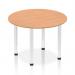 This image shows a dynamic round table with a 1000mm oak top and chrome post legs. The table has a sleek and modern design, with a sturdy and polished appearance. It is suitable for a variety of settings, from a conference room to a modern dining area. The round shape invites conversation and collaboration.