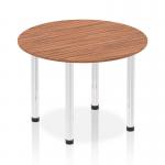 This picture features a dynamic round table with a 1000mm walnut top and chrome post leg. The table exudes a modern and sleek design, perfect for any contemporary space. The round shape allows for easy conversation and the chrome legs add a touch of elegance.