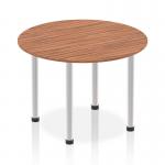 The picture shows a dynamic round table measuring 1000mm with a walnut top and brushed aluminium post leg. The sleek and modern design adds a touch of sophistication to any space. The round shape encourages social interaction and teamwork.