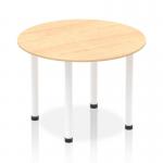 In the photograph, the Dynamic Round Tables Impulse has a modern and sleek design with a 1000mm round maple top and a white post leg. The table exudes a professional and sophisticated look, perfect for any office or conference setting. The clean lines and neutral colors make it versatile and stylish.