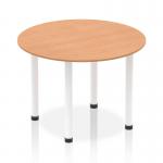 This photo captures a modern, 1000mm round table with an oak top and white post legs. The dynamic design creates an inviting and stylish atmosphere, making it a versatile choice for any space.