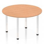 This photograph captures a stylish and modern dynamic round table with a sleek oak top and chrome post leg. The 1200mm round shape creates a versatile and inviting setting for any space.