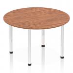 This image shows a stylish 1200mm round table with a walnut top and chrome post leg. The table has a dynamic and modern design, adding a touch of elegance to any space. It is perfect for both professional and casual settings.