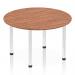 This image shows a stylish 1200mm round table with a walnut top and chrome post leg. The table has a dynamic and modern design, adding a touch of elegance to any space. It is perfect for both professional and casual settings.