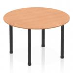 The image shows a vibrant and modern dynamic round table with a 1200mm oak top and black post legs. The sleek design and round shape give off an inviting and collaborative feel. Perfect for meetings, conferences, or casual gatherings.