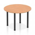 This image features a sleek, modern dynamic round table with a 1000mm oak top and black post leg. The table is perfect for creating collaborative and versatile work or dining spaces. A statement piece for any room.