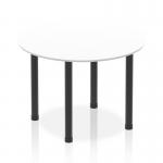 This photograph captures a sleek 1000mm round table with a white top and black post leg design. The dynamic round tables impulse adds a modern touch to any room and provides a versatile space for gathering or working.