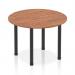 The photograph captures a sleek and modern dynamic round table, measuring 1000mm in diameter, with a warm walnut top and striking black post legs. It exudes a sense of innovation and sophistication, making it a perfect addition to any modern workspace.