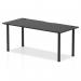 This photo showcases a sleek and modern Dynamic Tables Impulse Black Series table measuring 1800 x 800mm. It features a straight black top and cable ports, supported by sturdy black post legs. The overall look is highly functional and professional.