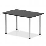 The image displays a sleek and modern Dynamic Tables Impulse Black Series 1200 x 800mm Straight Table. The black tabletop contrasts perfectly with the chrome legs, giving it a sophisticated look. Cable ports can be seen on the table, providing a practical solution for managing cords.