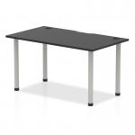 The picture shows a sleek and modern Dynamic Tables Impulse table from the Black Series, measuring 1400 x 800mm. The black top is complemented by silver legs, and features convenient cable ports for a clean and organized workspace.