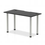 The Dynamic Tables Impulse Black Series straight table has a sleek 1200 x 600mm black top with convenient cable ports and a sturdy silver leg.