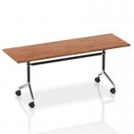 The image shows a large rectangular table with a beautiful walnut top. It features a unique flip top design that allows it to be easily moved and stored. Perfect for dynamic meetings or events.