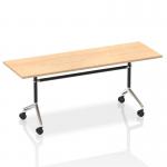 The photograph captures a sleek and versatile rectangular table with a maple top. The dynamic flip top design adds functionality to any space, while the Impulse brand ensures reliable quality. The table measures 1800mm in length, making it suitable for various purposes.