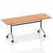 This picture features dynamic flip top tables, specifically the Impulse 1800mm flip top rectangular table with an oak top. The sleek design and functional flip top make it a versatile choice for any workspace. The table is depicted in a natural wood color with sturdy legs, providing a modern and sophisticated look.