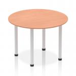 This photo features a stylish round table with a beech top and silver post leg. Its dynamic design is perfect for modern spaces and adds a touch of sophistication.