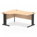 This photograph showcases a dynamic left hand desk, perfect for any modern office. The Impulse desk features a 1600mm maple top, complemented by a black cable managed leg. The left crescent shape adds a unique touch, creating a functional and stylish workspace.