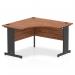 The photograph features a sleek and modern dynamic corner desk with a spacious 1200mm walnut top and black cable-managed legs. The desk is perfect for offices and offers both style and functionality.