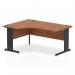 This image features a sleek, modern Dynamic Left Hand Desks Impulse office desk. It measures 1600mm and has a unique left crescent design. The desk has a beautiful walnut top and is supported by a black cable managed leg.
