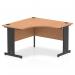 The photo shows a sleek and modern Dynamic Corner Desk from the Impulse collection. The desk features a 1200mm oak top with black cable managed legs, creating a clean and organized workspace. Its corner design maximizes space and allows for optimal productivity.