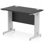 This photograph showcases a sleek and modern Dynamic Cable Managed Desk. It features a black top, complemented by silver cable managed legs. The desk measures at 1000 x 600mm and has a straight design, making it perfect for any office space.