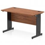 This picture features a sleek and modern Dynamic Cable Managed Desk, measuring 1200 x 600mm. The desk has a beautiful walnut top and black cable managed legs for a clean and organized workspace.