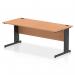 This photo features a sleek and modern Dynamic Cable Managed Desk. The desk measures 1800 x 800mm and has a straight oak top with a black cable managed leg. Perfect for keeping your workspace organized and clutter-free.