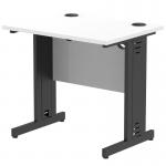 The photo shows a sleek, modern office desk with a white top and black cable-managed legs. The desk measures 800 x 600mm and features a dynamic, clean design for efficient cable management.