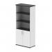 A modern, sleek photograph of a set of tall cupboards from the Impulse series. The cupboards are dynamic with open shelves and come in a striking black and white color scheme. The white doors add a clean, contemporary touch.