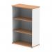 The photo features a dynamic large bookcase, measuring 1200mm, in a striking oak and white color. It is an Impulse bookcase with a sleek design and ample storage space. The combination of wood and white adds a modern touch to any room.