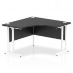 This photograph captures a modern and sleek Dynamic Corner Desk with a 1200mm black top and white cantilever legs. The desk is designed to fit perfectly in a corner, making it ideal for optimizing space in any office.