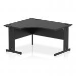 In the photo, we can see a sleek and modern black office desk with a crescent shape on the left side. The top is also black and there is a cable management system incorporated into the leg for a clean and organized look. It exudes a dynamic and professional feel, perfect for any office setting.