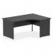 The photograph showcases a sleek and modern Dynamic Right Hand Desks Impulse 1600mm Right Crescent Office Desk. The desk features a black top panel and end leg, creating a clean and professional look. Perfect for any office setting.