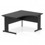 This image captures a sleek and modern office setup with a dynamic right hand desk at the center. The desk, measuring 1400mm, features a striking black top and cable managed legs. A unique crescent shape adds a touch of elegance to the overall design.