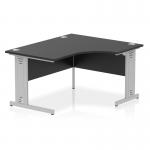 The photo features a modern office desk with a 1400mm right crescent shape. The black top contrasts with the silver cable managed leg, giving off a sleek and dynamic vibe. This desk is designed to help with productivity and organization in the workplace.