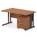 This photo showcases a sleek and modern Dynamic Pedestal Desk Impulse. The 1400 x 800mm straight office desk features a rich walnut top and a sturdy black cantilever leg workstation. A 2 drawer mobile pedestal adds convenient storage, making this the perfect addition to any office space.