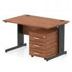 This photo shows a sleek, modern Dynamic Pedestal Desk Impulse with a walnut top and black cable managed leg. The desk is 1200 x 800mm and includes a 3 drawer mobile pedestal. The workstation is perfect for any office or workspace.