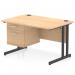 This picture features a dynamic pedestal desk with a maple top, black cantilever leg workstation, and a 2 drawer fixed pedestal. The desk measures 1200 x 800mm and is straight in design. It provides a functional and stylish workspace for any office.