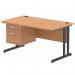 The photo shows a dynamic pedestal desk with an oak top and black cantilever leg. It measures 1400 x 800mm and features 1 fixed pedestal with 2 drawers. The workstation is sleek and modern, fitting perfectly into any office space.