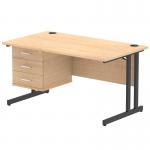 This photograph captures a sleek and modern office desk, measuring 1400 x 800mm with a maple top and black cantilever legs. The desk is accented with a 3 drawer fixed pedestal, adding both style and practicality to any workspace.