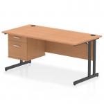 The Dynamic Pedestal Desk Impulse features a stylish oak top and black cantilever legs. Measuring at 1600 x 800mm, this straight office desk includes a 2 drawer fixed pedestal, providing ample storage space. This workstation is modern and practical, making it a great addition to any office space.