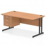 The Dynamic Pedestal Desk Impulse features a spacious 1600 x 800mm oak top with a sleek black cantilever leg. It includes a fixed pedestal with 3 drawers for storage. This straight office desk is perfect for any modern workstation setup.