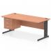 This photograph captures a dynamic pedestal desk with an Impulse 1800 x 800mm beech top and black cable managed leg workstation. It features a 3 drawer fixed pedestal and exudes a modern and sleek design. A perfect addition to any office space.