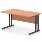 The photo features a dynamic rectangle desk with a scalloped edge and a beech top. It is completed with black cantilever legs and measures 1400 x 800mm. The modern design is perfect for a straight office desk.